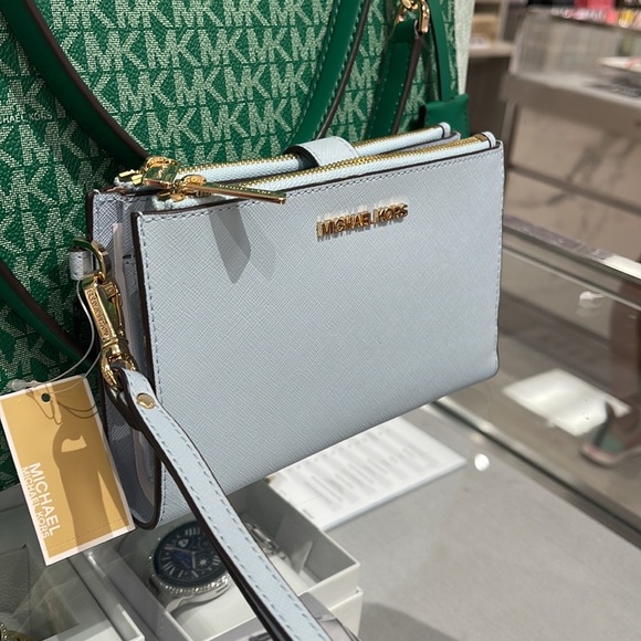 MICHAEL KORS LARGE DOUBLE ZIP WRISTLET WALLET PHONE CASE CLUTCH 
Vista Blue - Picture 7 of 16